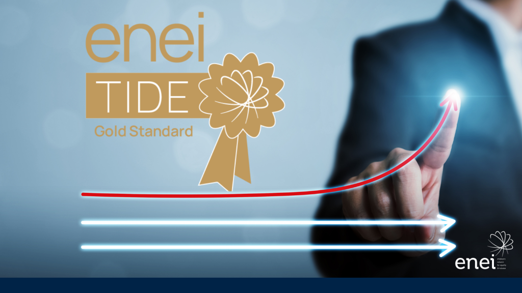 The image shows a male in businesswear pressing his finger against the screen as if drawing a red line with an uptick, against two other white lines which are flat. The gold standard TIDE logo appears above the lines and an enei logo in white is in the bottom right hand corner.
