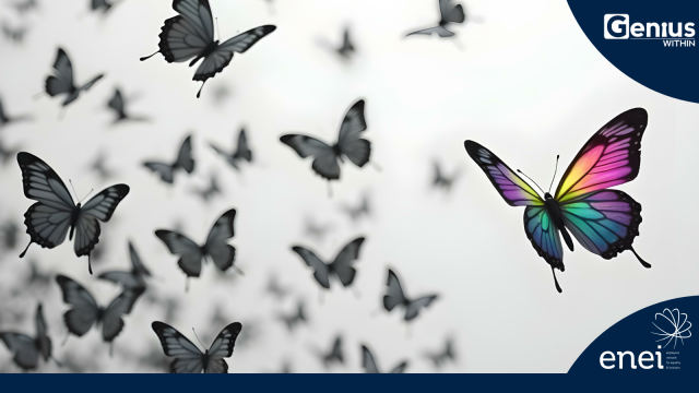 The image shows a group of butterflies in flight, with all in monochrome shades, and one colourful butterfly in the foreground. "Genius within" and "enei" logos in corners.